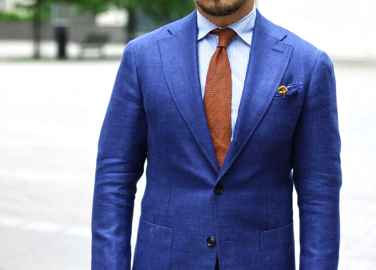 light blue shirt and orange tie color combination