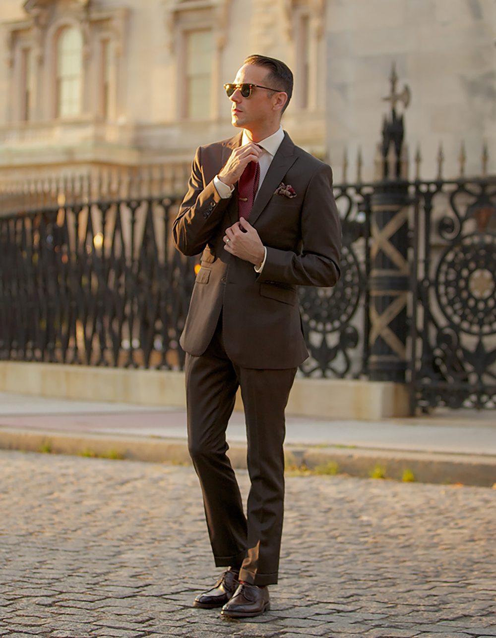 brown suit white shirt burgundy shoes and tie