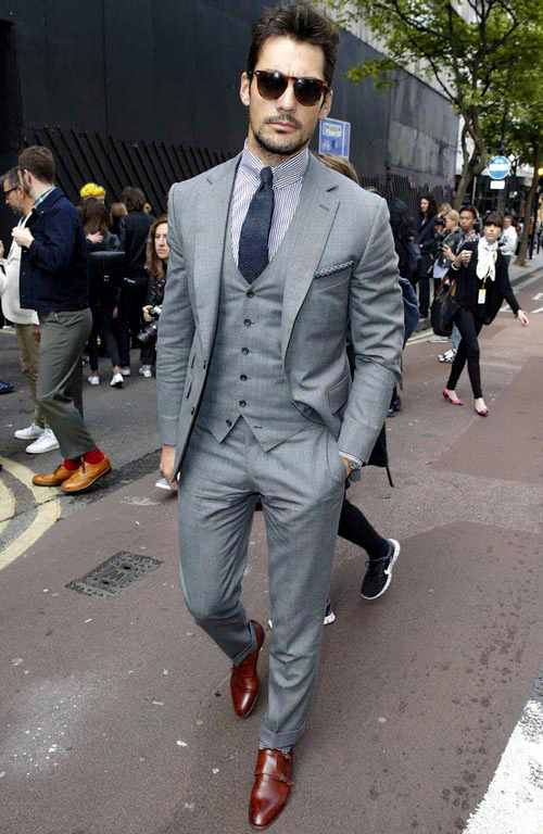 Light grey suit with blue stripe shirt, navy tie and brown shoes color combination