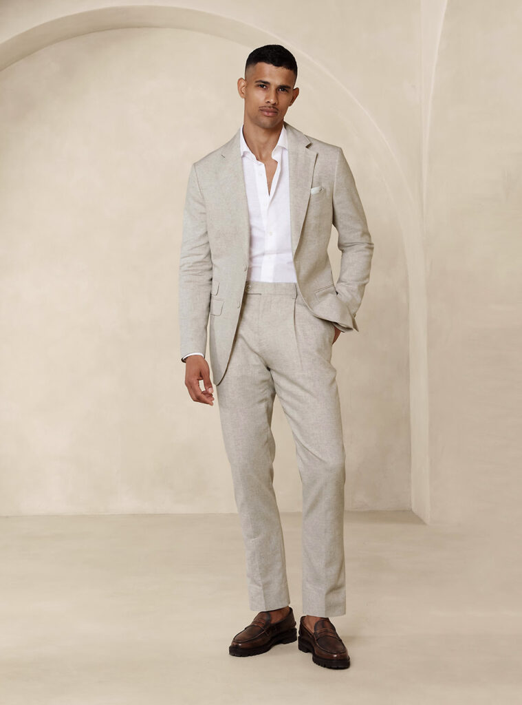 beige suit, white dress shirt, dark brown loafers