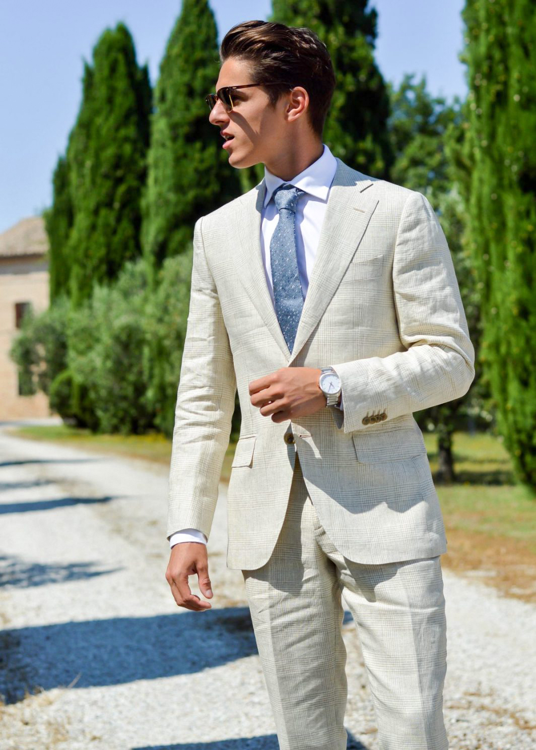 white shirt with baby blue pattern tie