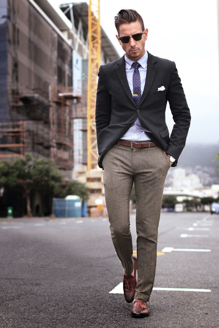 Black blazer, light blue shirt, brown trousers, and brown loafers
