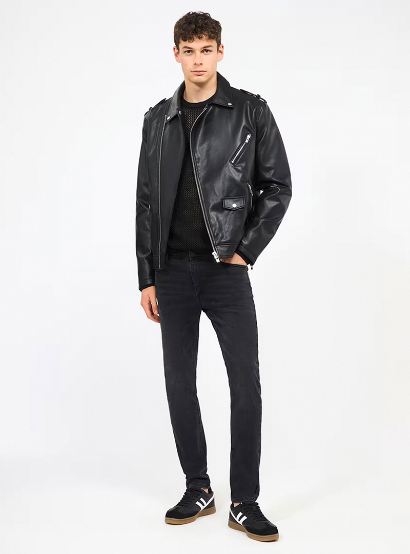 All black: leather jacket, crew neck, jeans, and sneakers