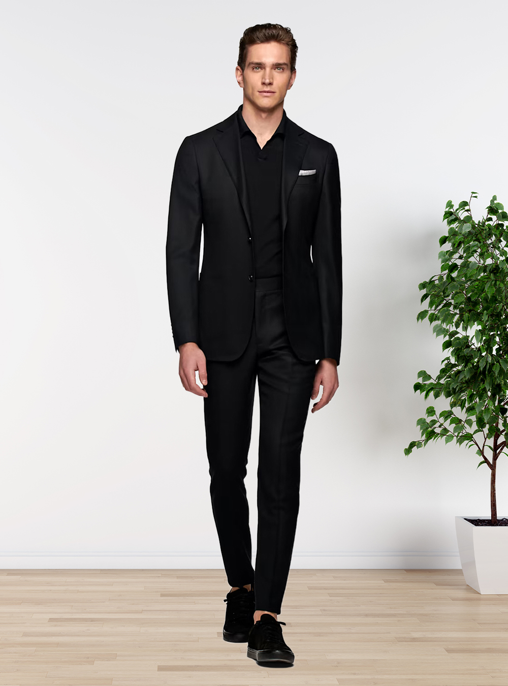 black suit, black polo T-shirt, and black sneakers