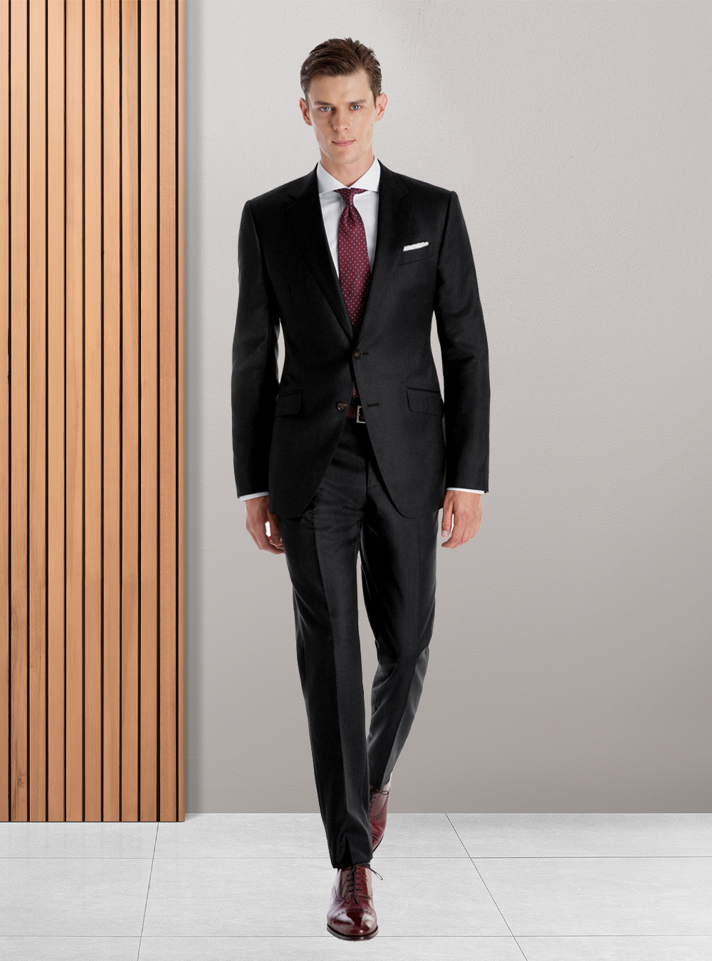 black suit, white dress shirt, burgundy tie, and burgundy oxford shoes