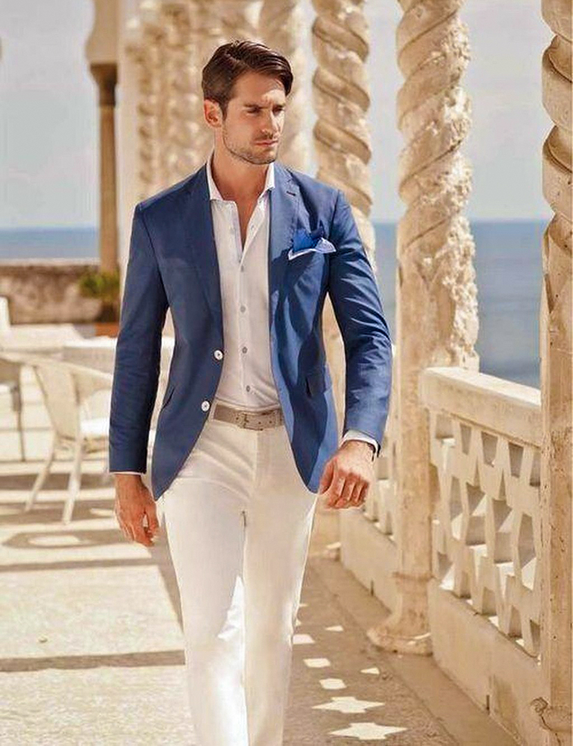 Blue blazer, white shirt, and white trousers