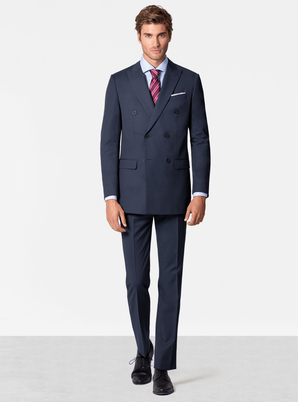 Blue double-breasted suit, light blue dress shirt, purple tie and black derby shoes