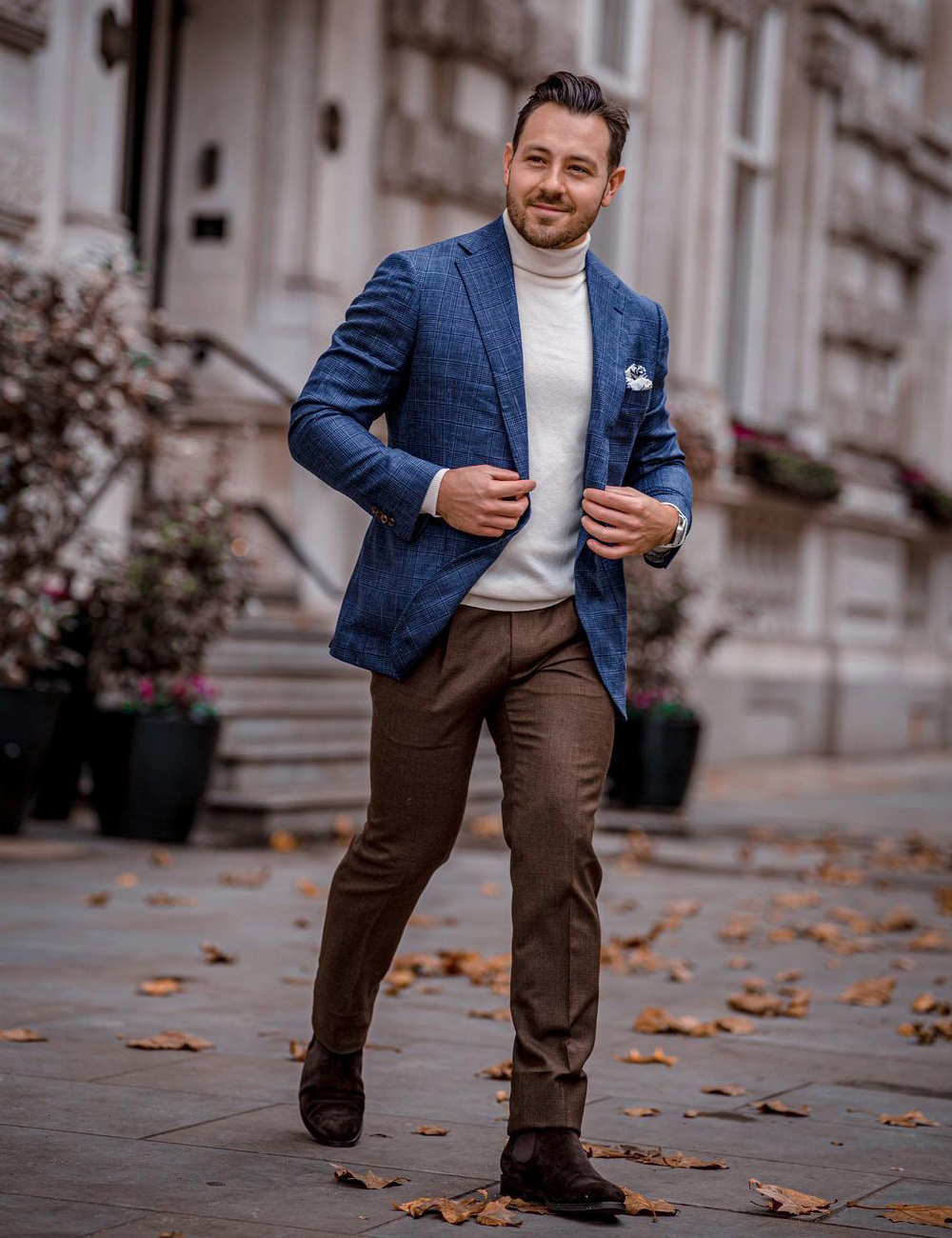 blue plaid blazer, beige turtleneck, brown dress pants, and brown Chelsea