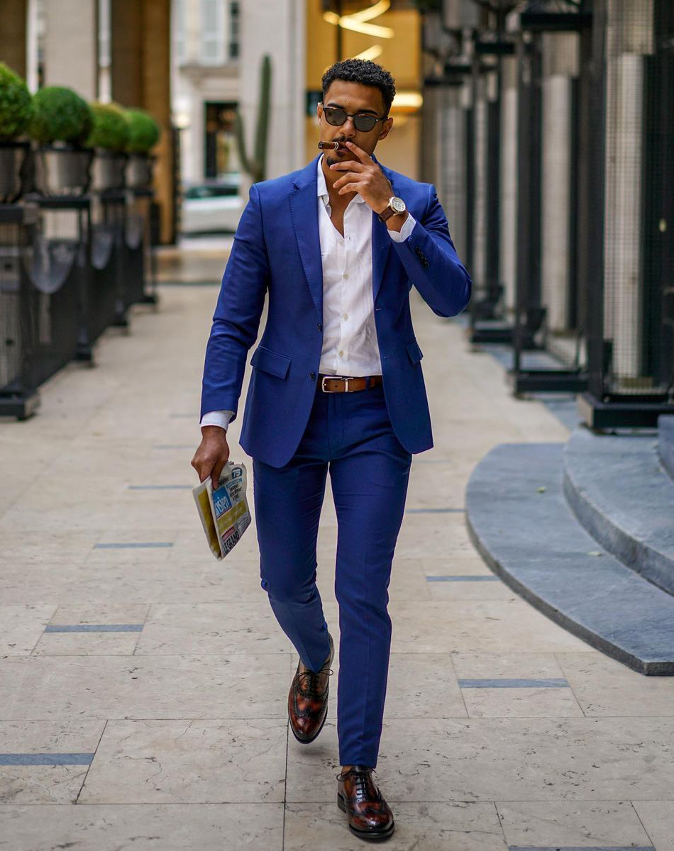 blue suit with brown dress shoes