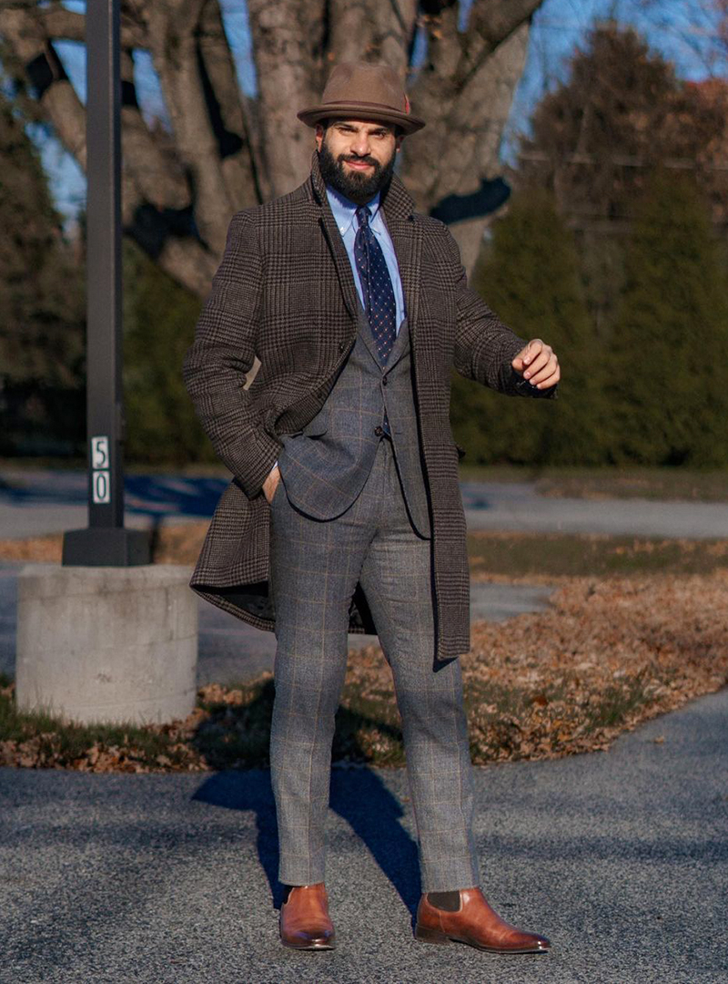 charcoal suit, blue shirt, and brown Chelsea