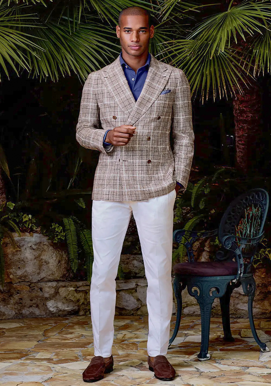 brown plaid double-breasted blazer, blue polo, white chinos, and brown loafers