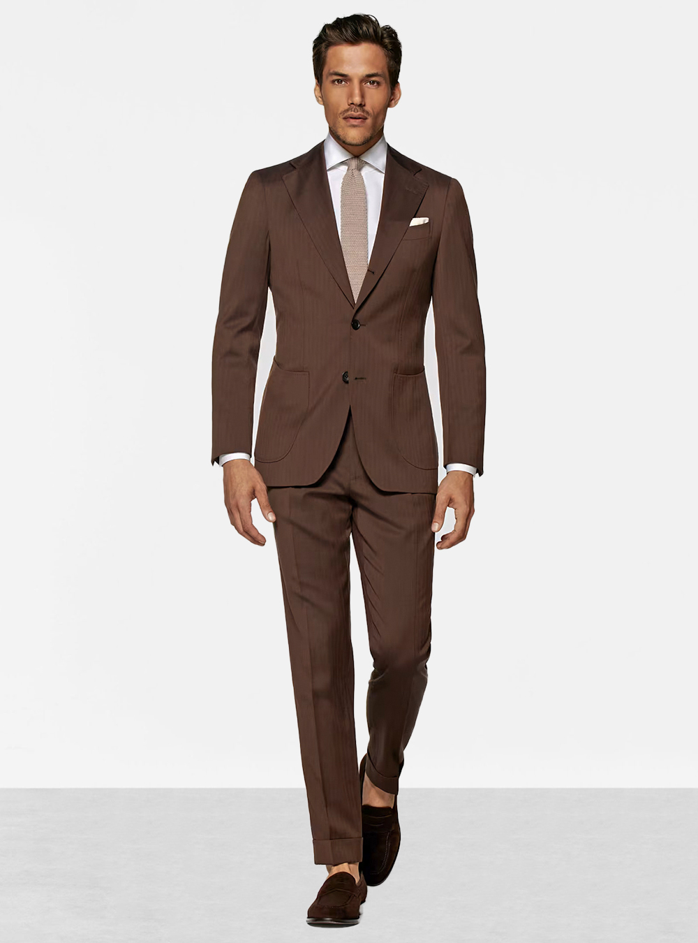 brown suit, white dress shirt, tan tie and brown loafers