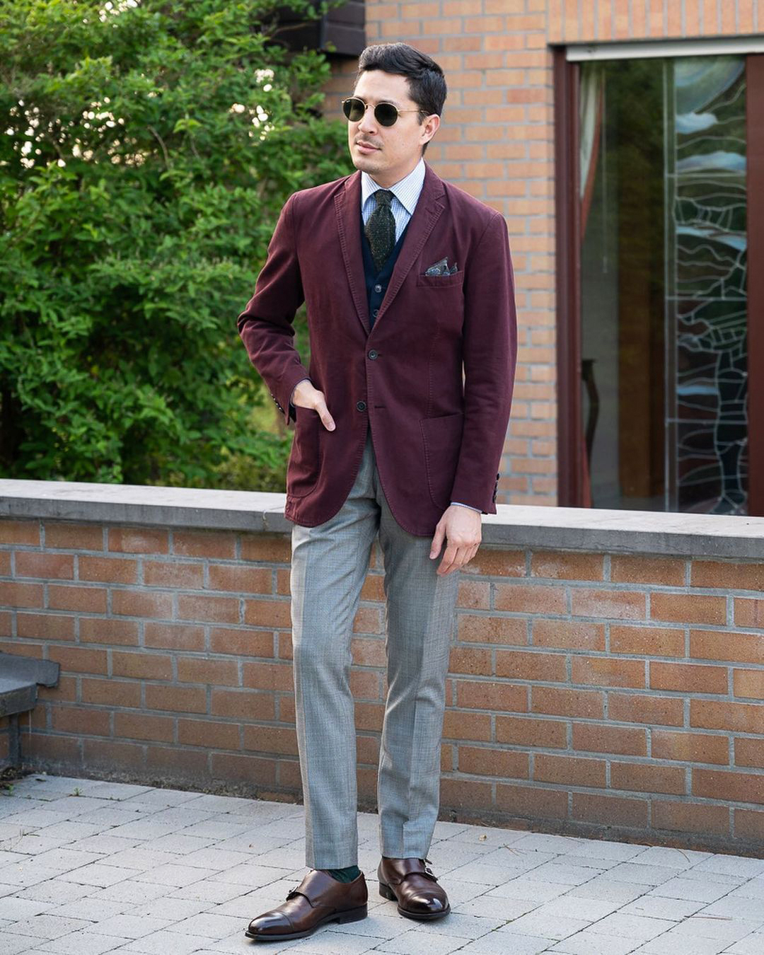 Burgundy corduroy blazer, blue checked shirt, light grey trousers