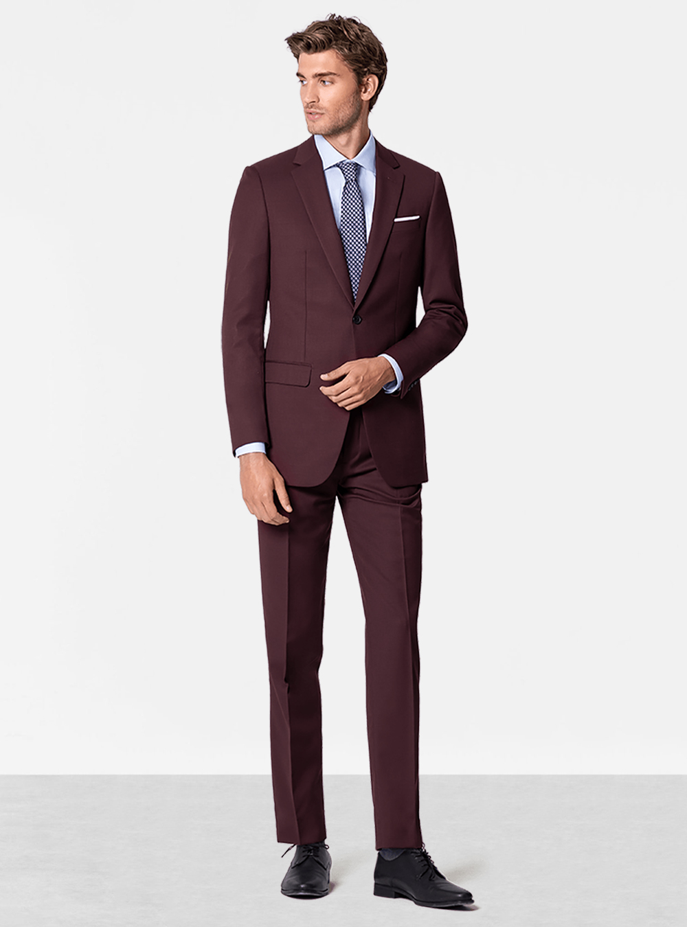 Burgundy suit, blue dress shirt and black derby shoes