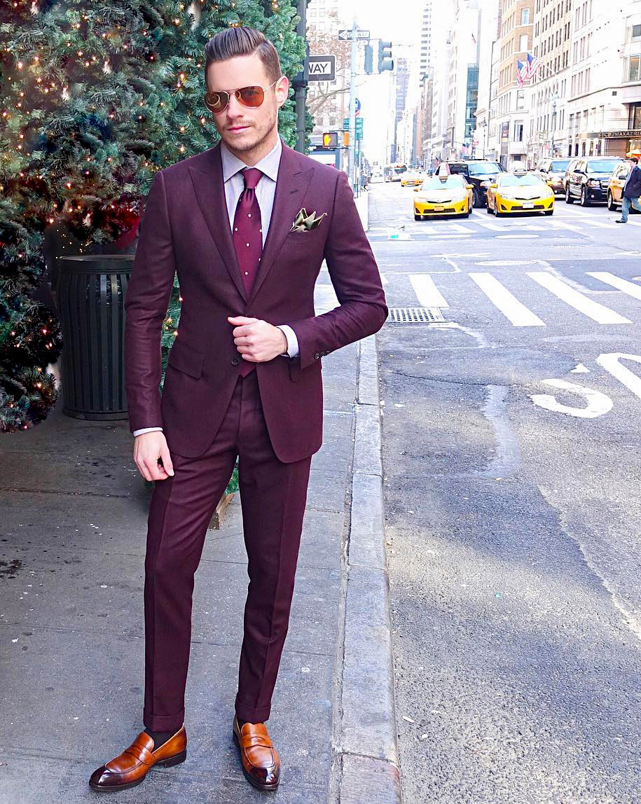 burgundy suit, pink shirt, maroon tie, light-brown loafers