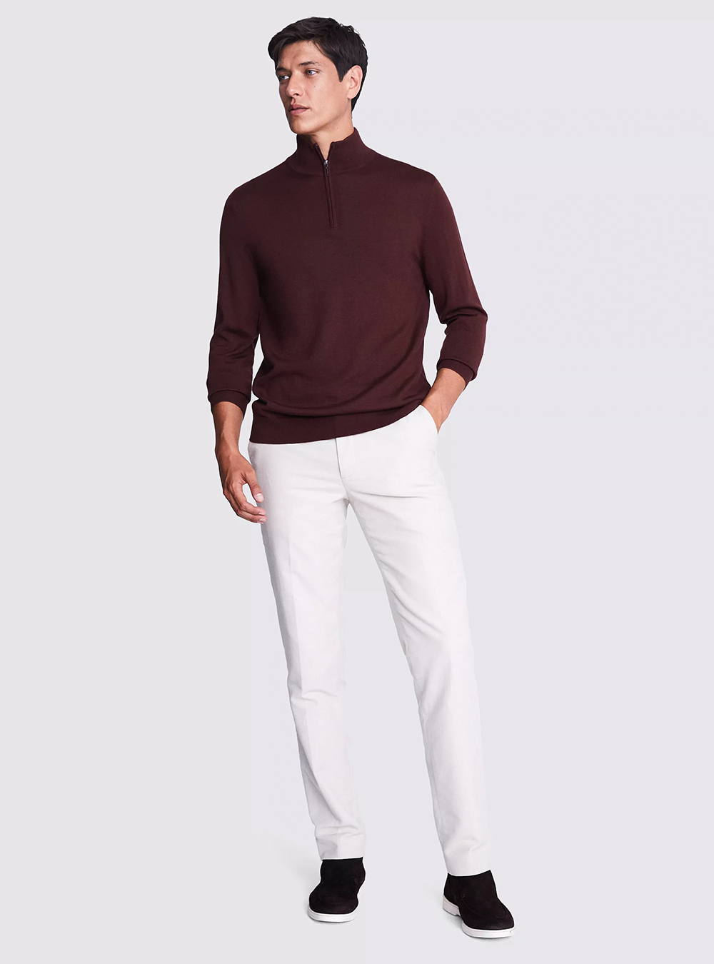 burgundy sweater, white chinos, and black suede loafers