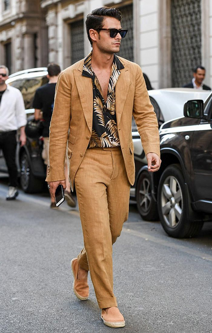 casual bronze tan suit with black floral shirt