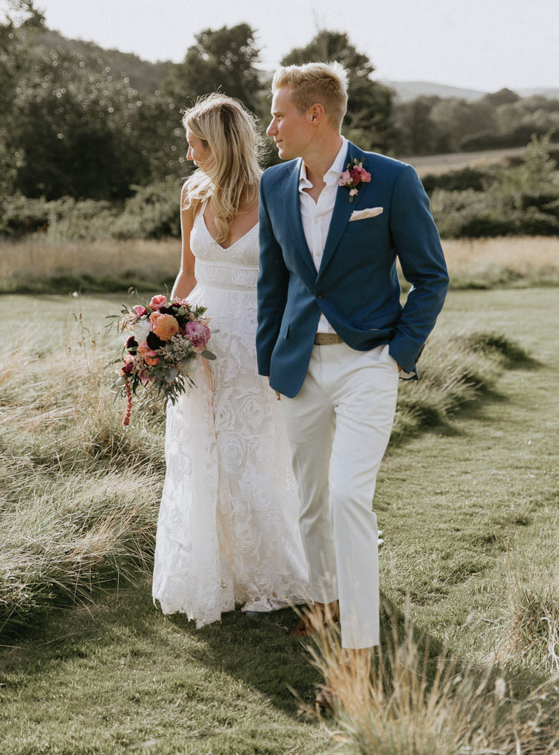 casual mountain wedding attire with a blazer, shirt, and pants