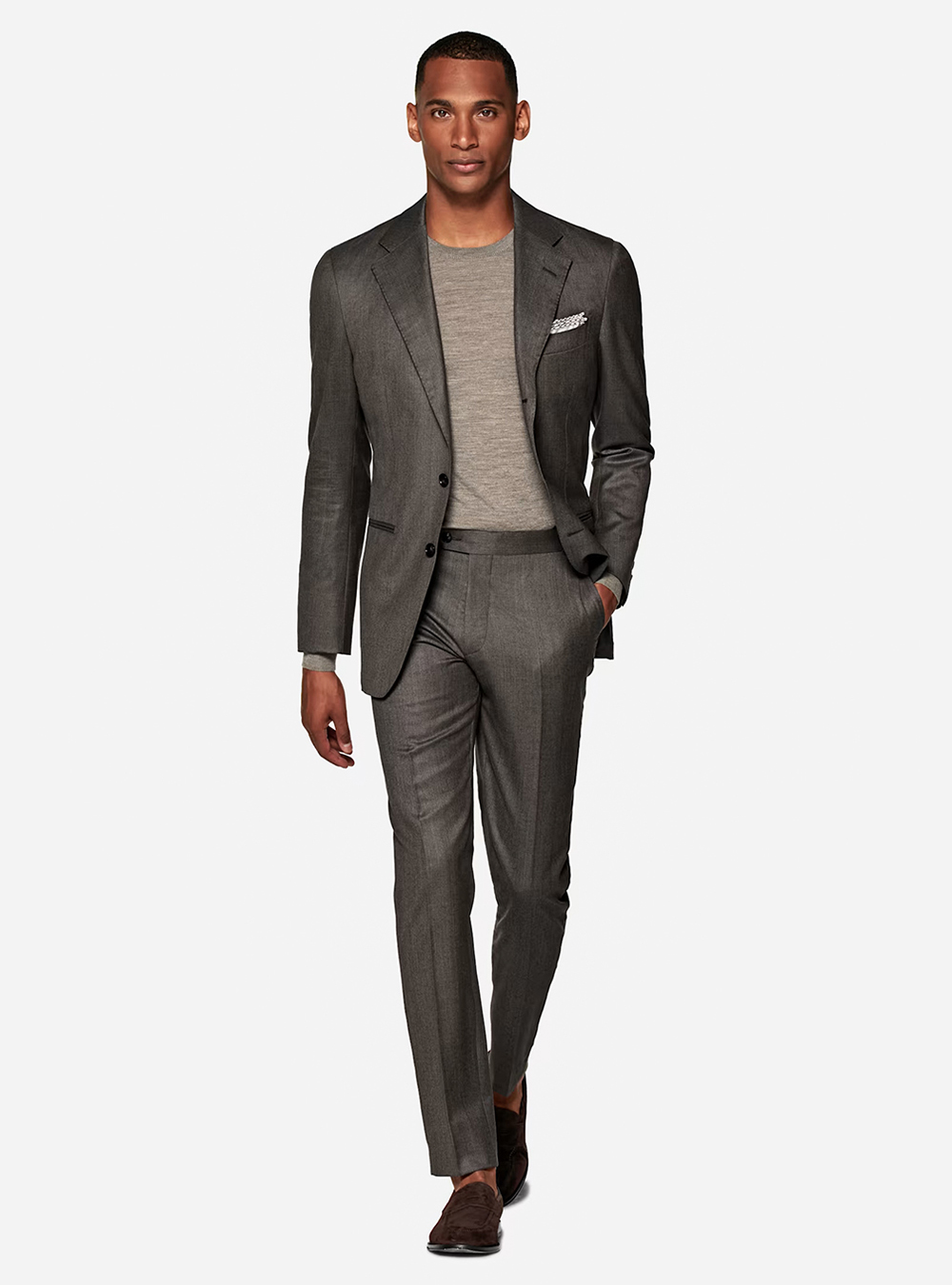 charcoal grey houndstooth suit, grey t-shirt, and brown suede loafers