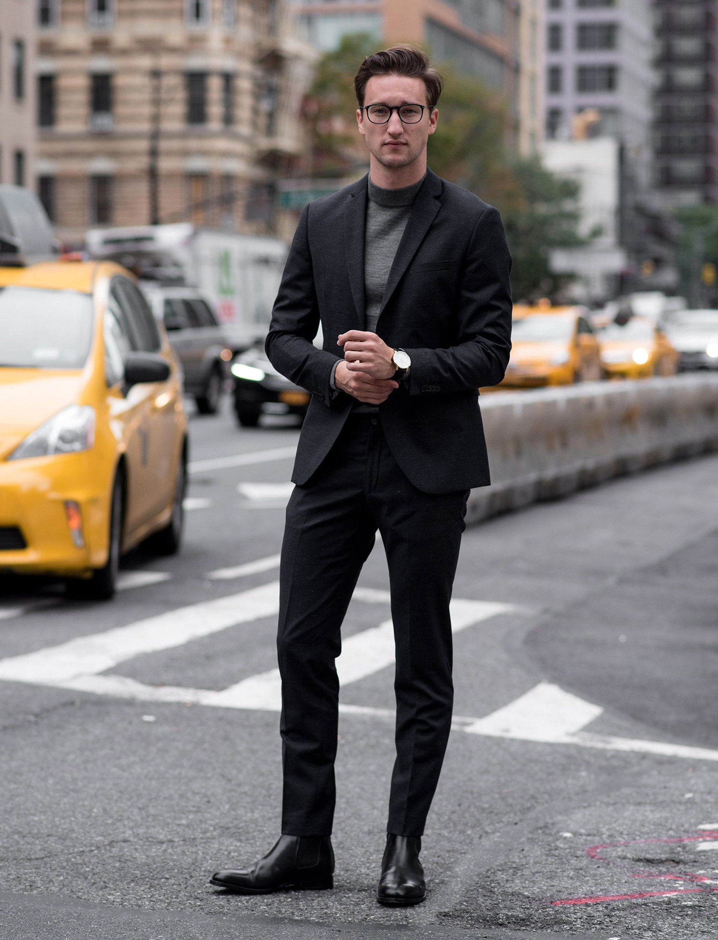 charcoal grey suit with a grey turtleneck and black chelsea