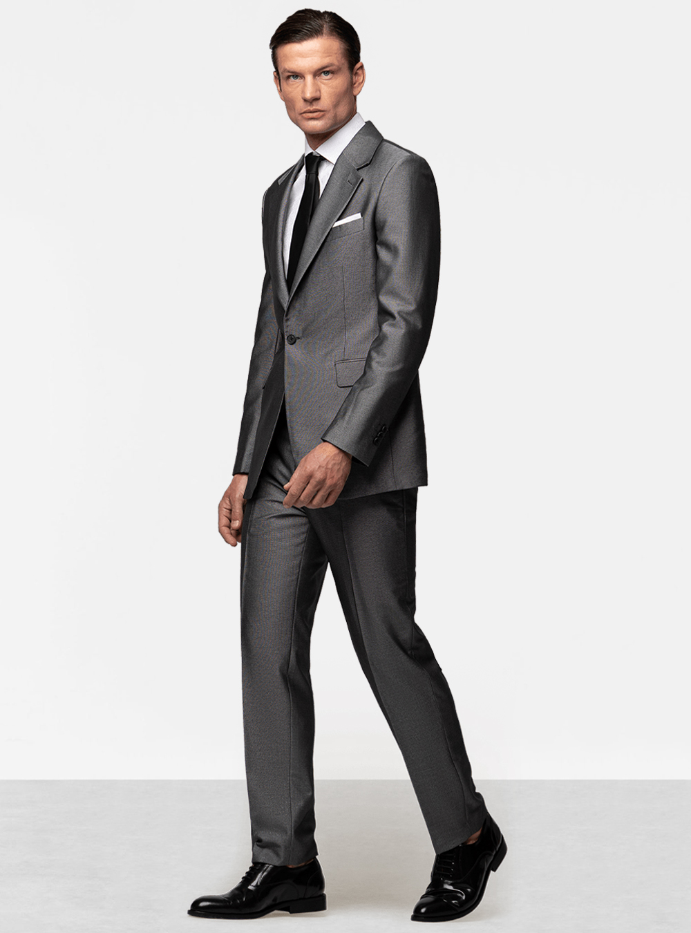 Charcoal suit, white dress shirt, black tie and black oxford shoes