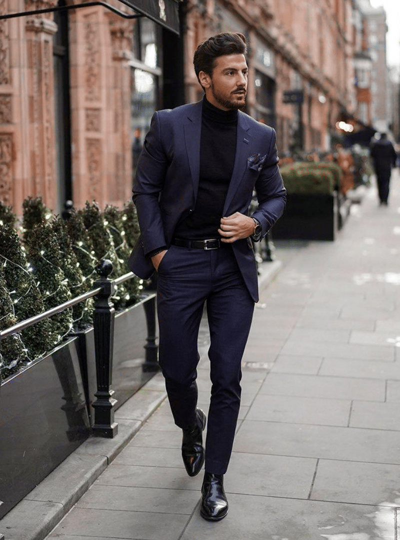 cocktail attire: navy blue suit with a black chelsea boots