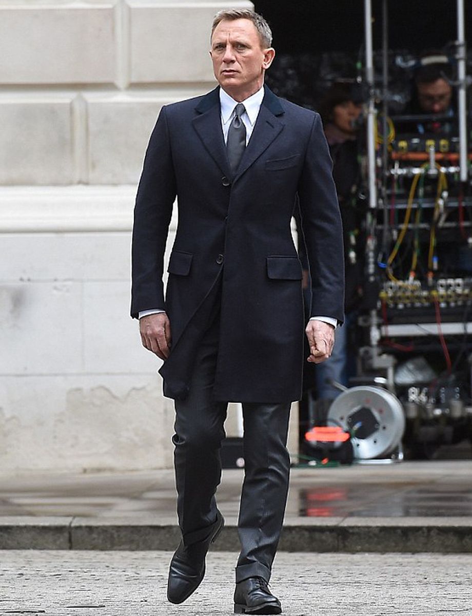 Bond wearing black Oxford shoes