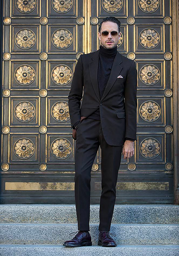 dark brown suit and black turtleneck