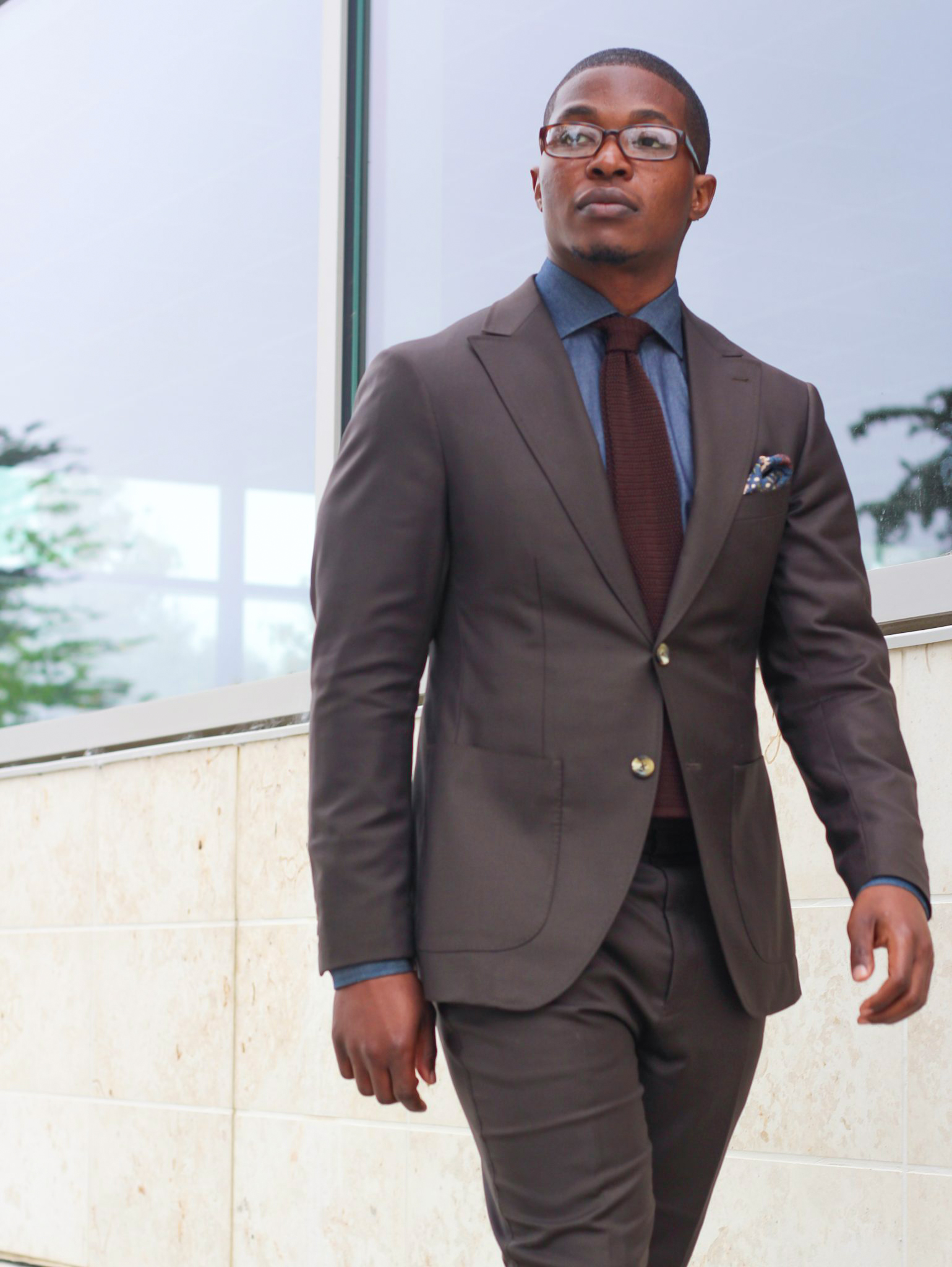 dark brown suit, navy shirt and burgundy tie color combination