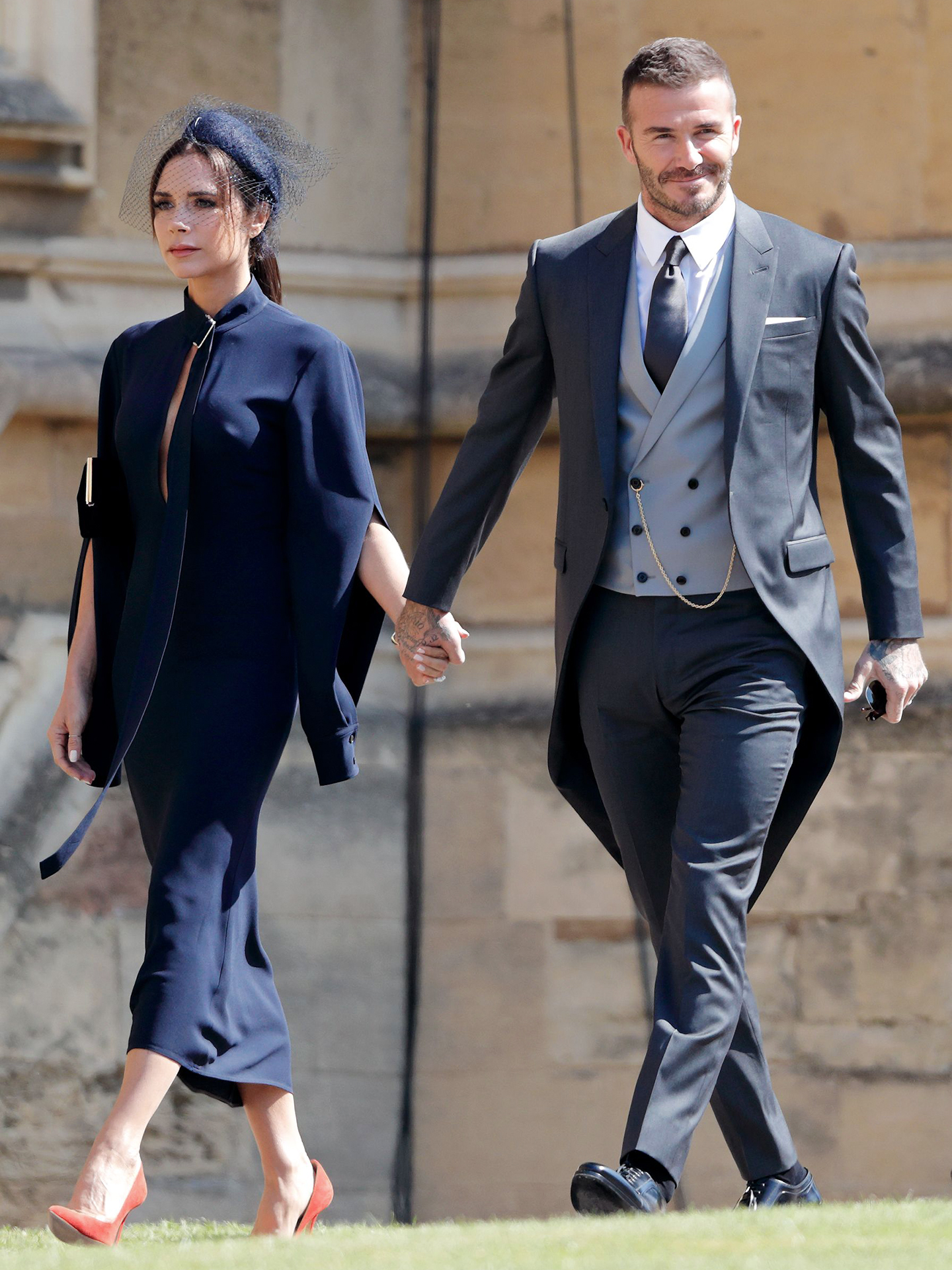 David Beckham wears charcoal grey morning dress coat as a wedding guest