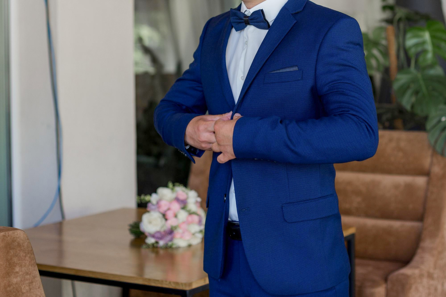 father of the bride in a blue suit