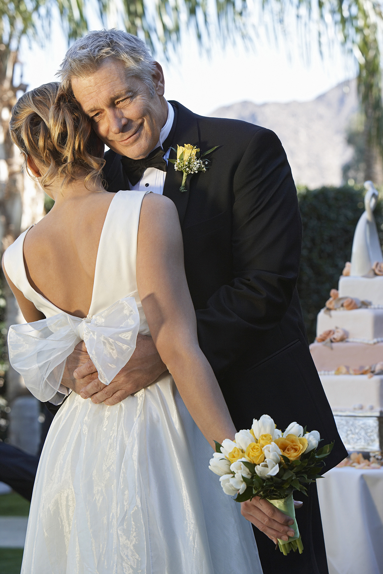 father of the bride in formal wear black tuxedo