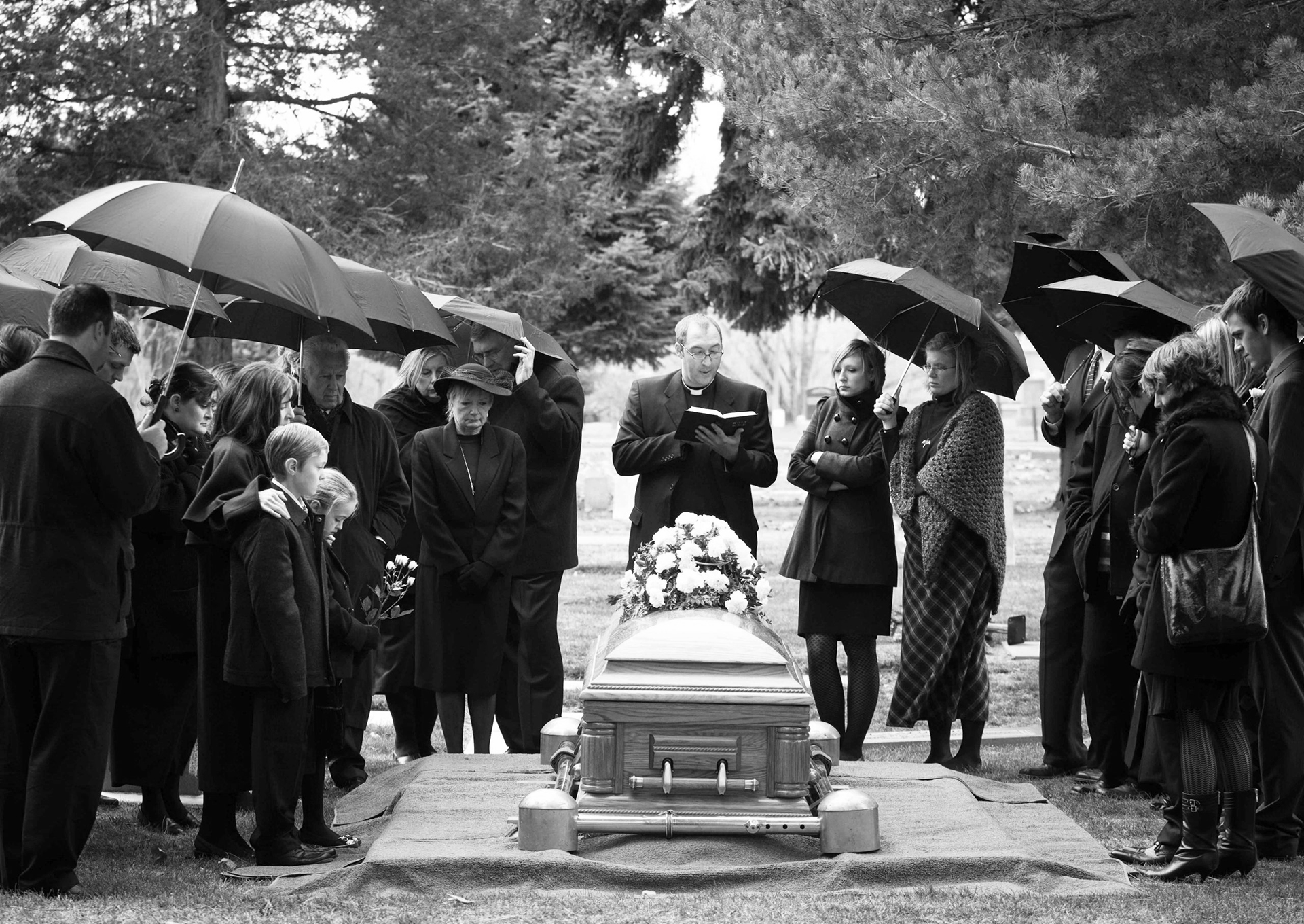 Portrait of a boy in a black suit with a funeral bouquet of flowers AI  generated 30790114 Stock Photo at Vecteezy