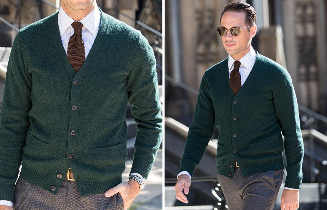 green cardigan over windowpane patterned shirt and brown tie