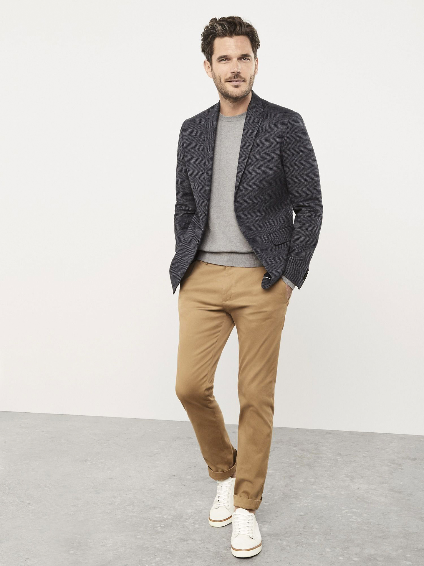 wearing a grey blazer with khaki chino pants