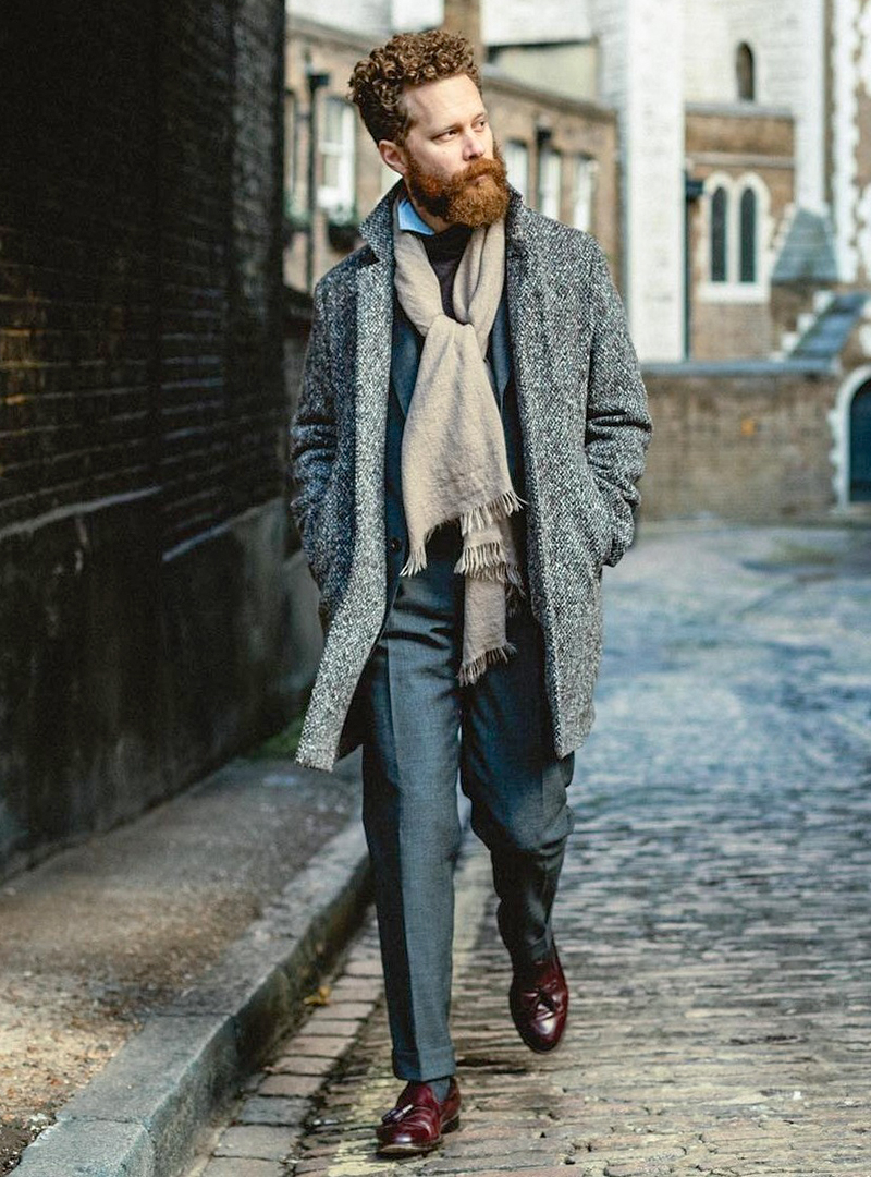 Grey overcoat, charcoal suit, brown turtleneck, light blue dress shirt, beige scarf and brugundy loafers