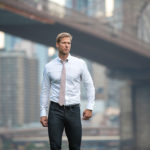 How should a dress shirt fit