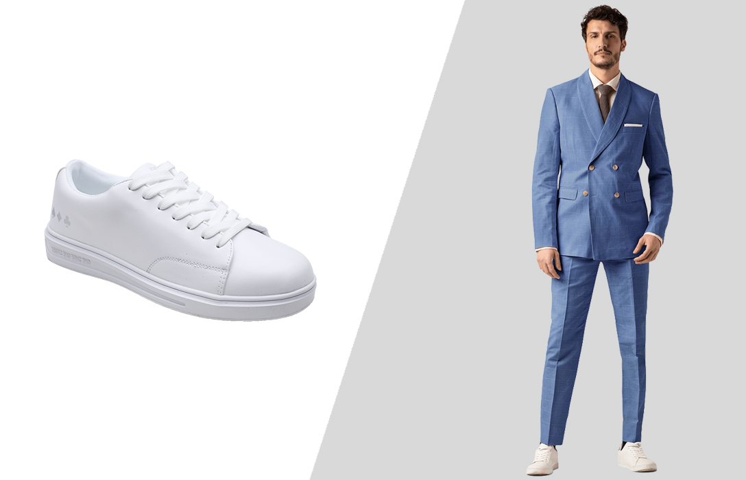 wearing sneakers with a light blue suit