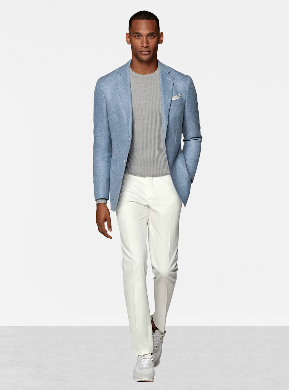 light blue blazer, grey T-shirt, white pants, and grey sneakers