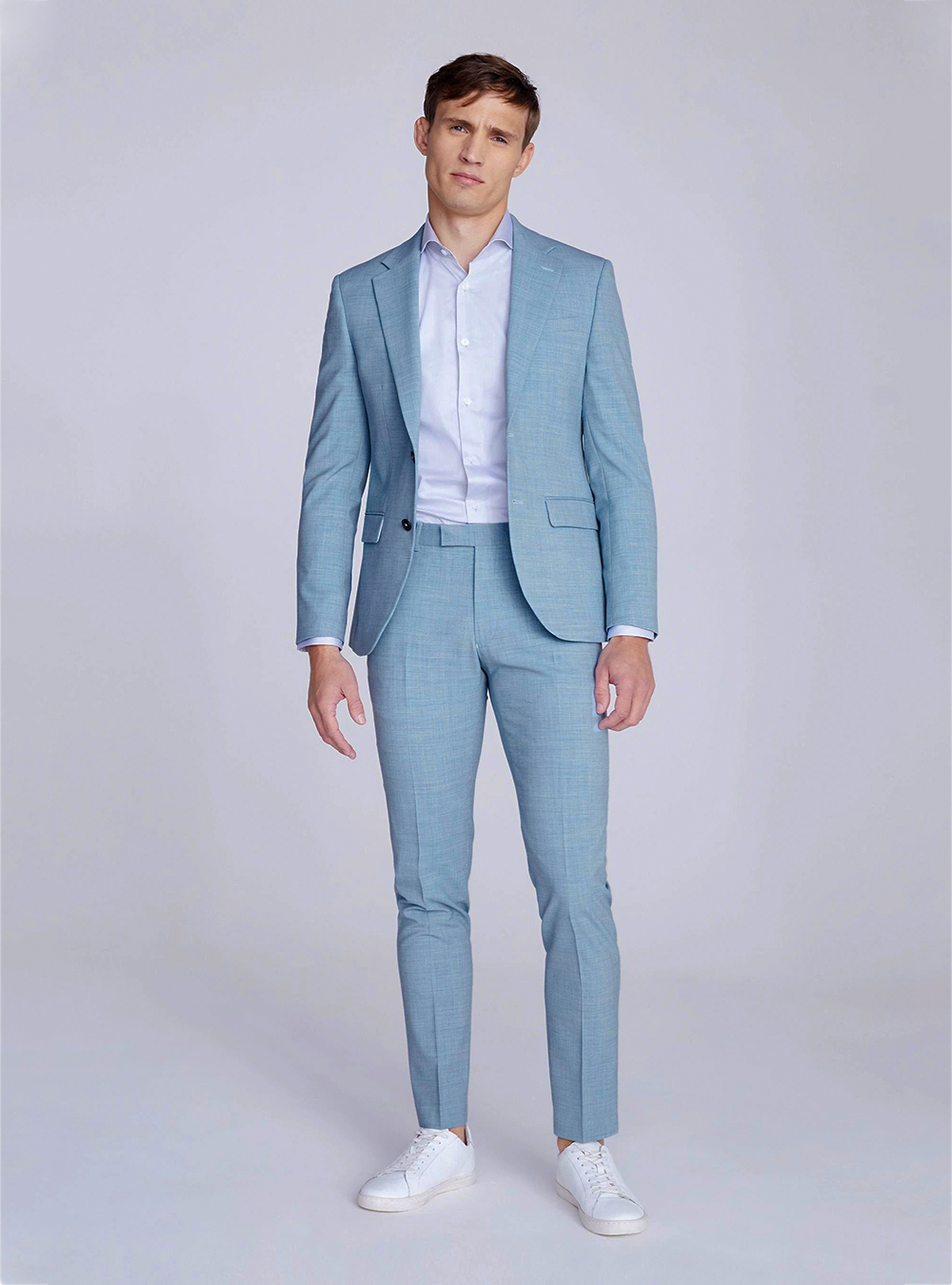 Light blue suit, light blue shirt and white sneakers