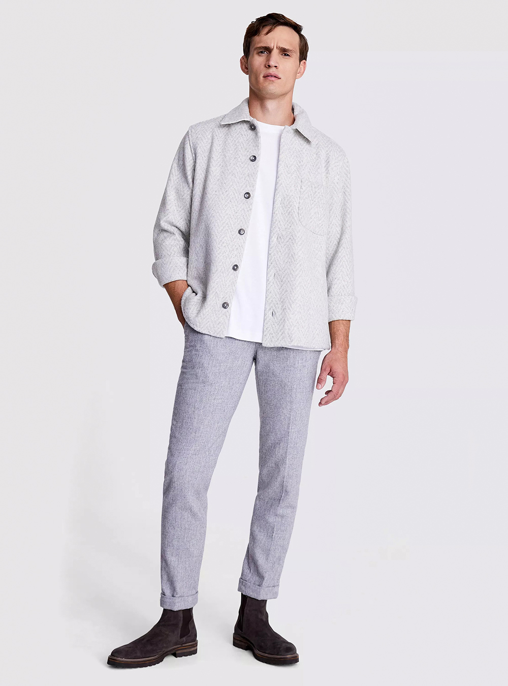 light grey overshirt, white t-shirt, grey pants, and brown suede chelsea boots