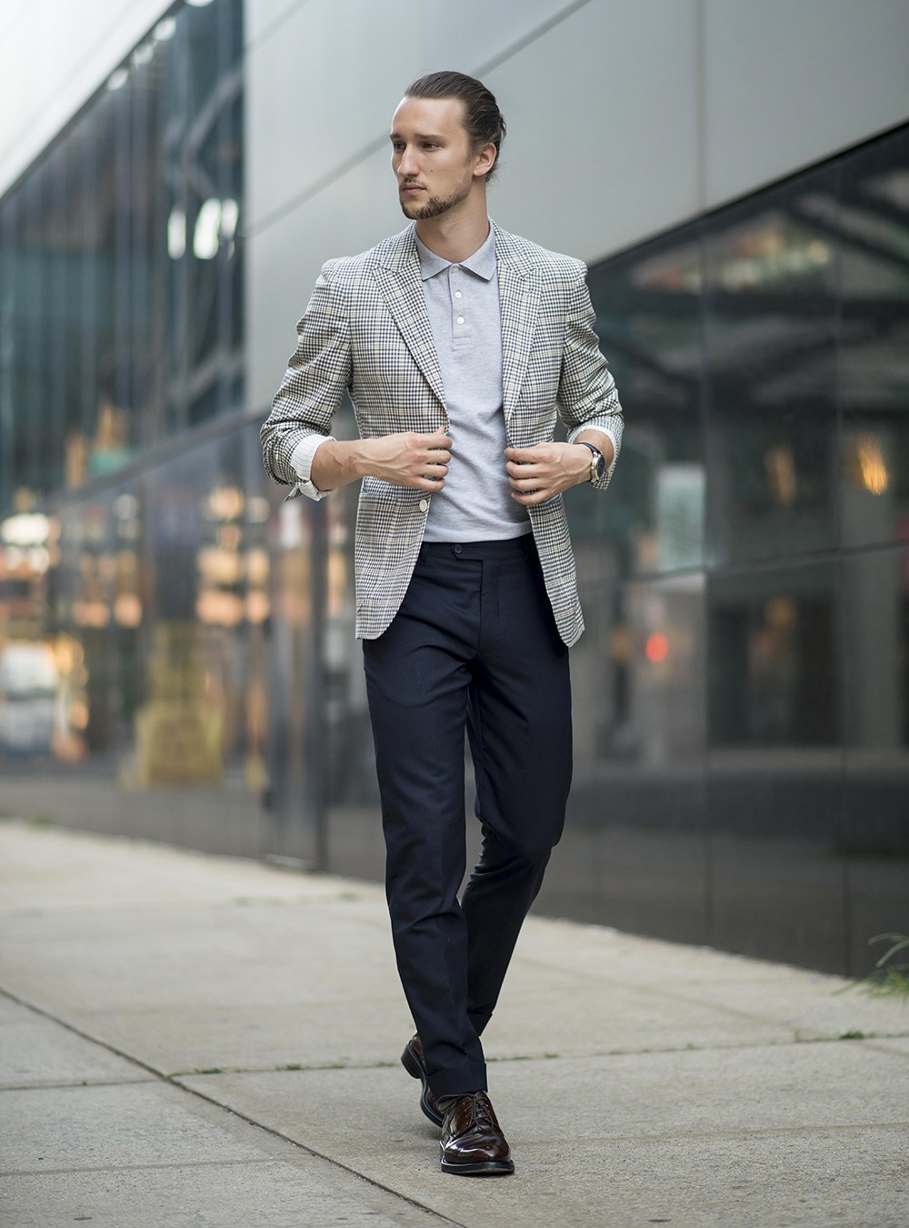 Man Wearing Black Polo Shirt and Gray Dress Pants · Free Stock Photo