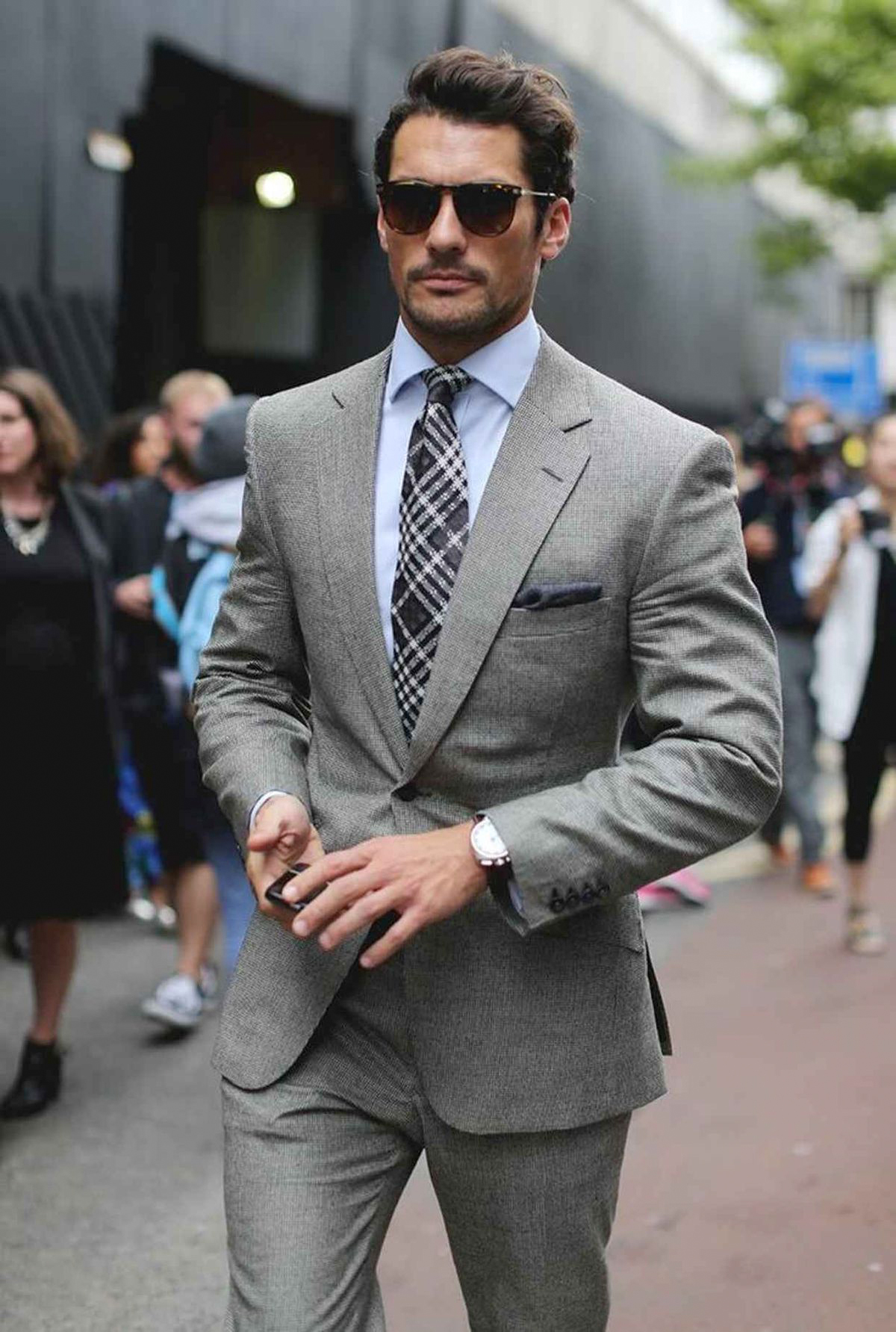 Light grey suit and blue shirt color combination