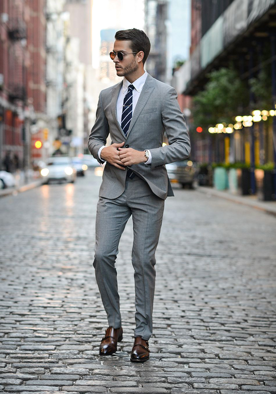 Light grey suit, white shirt, and brown shoes color combination