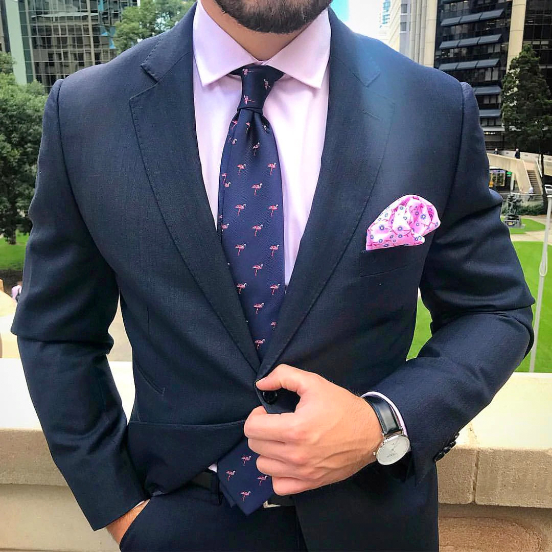 matching navy suit and tie with pink dress shirt
