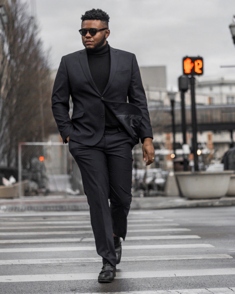 black suit, turtleneck, and shoes