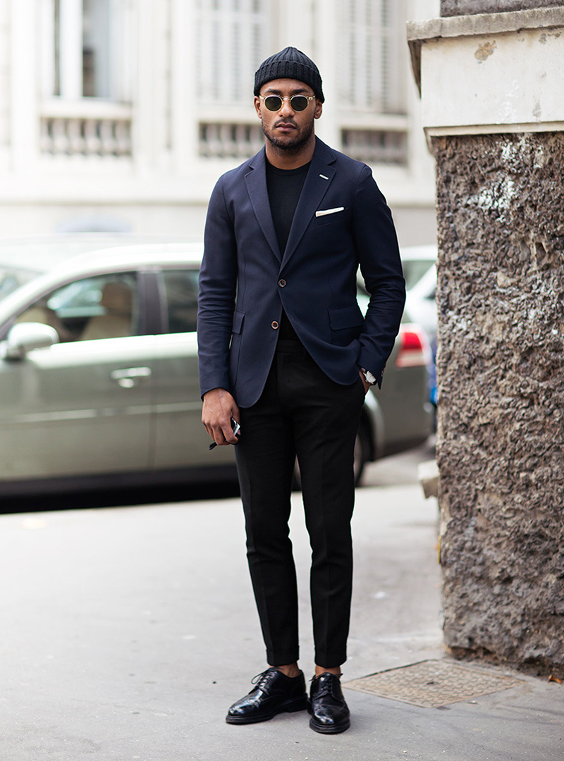 navy blazer, black t-shirt, black pants, and black derby shoes