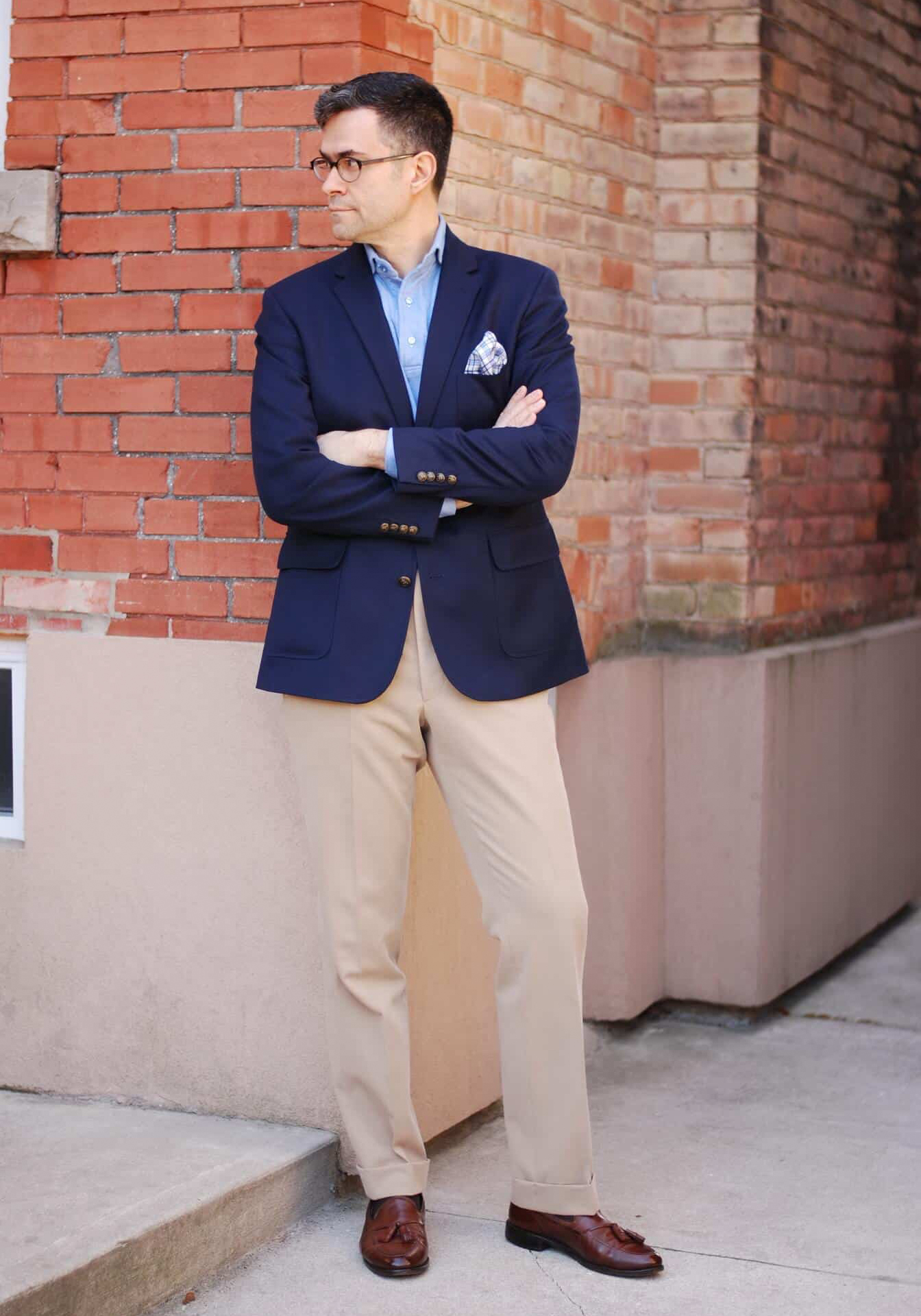 navy blazer, blue dress shirt, tan pants, and brown loafers