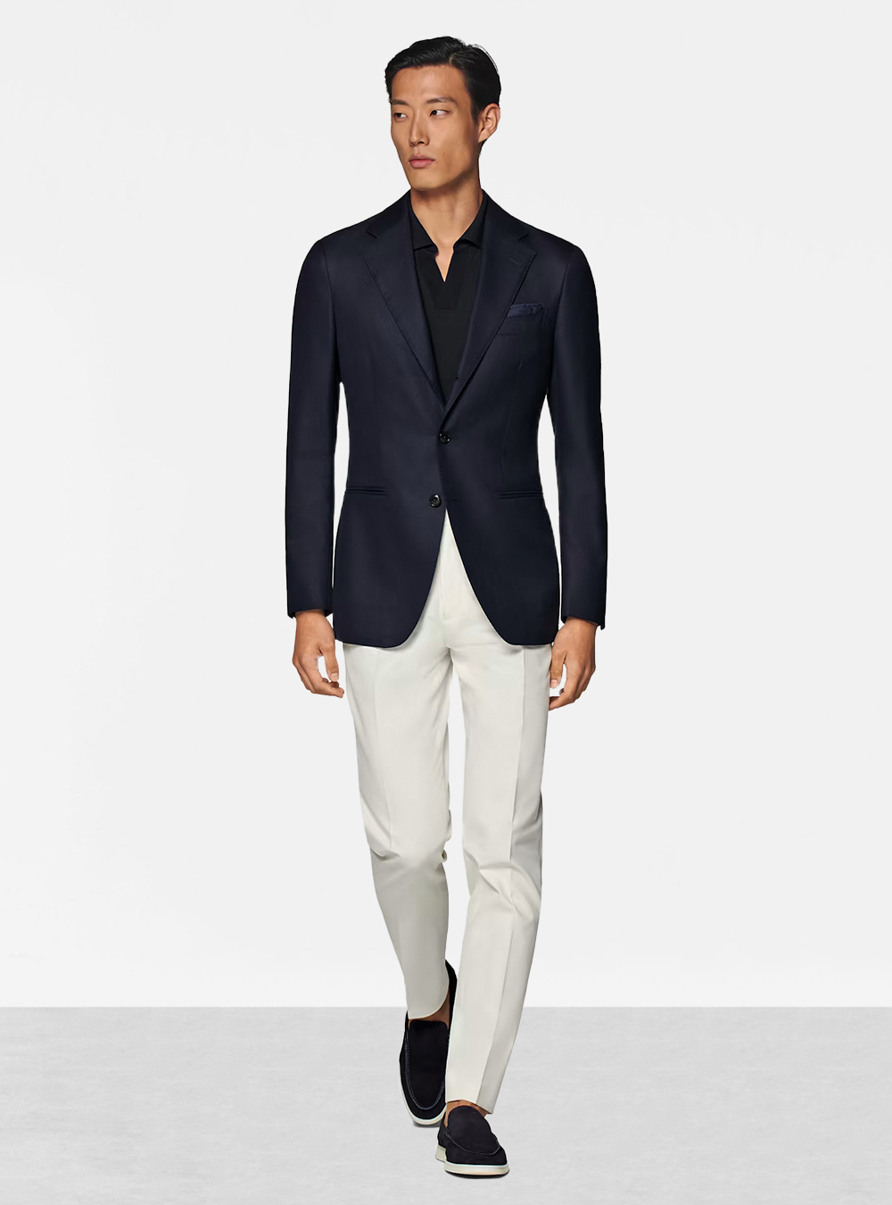 navy blazer, navy polo T-shirt, white pants, and navy loafers