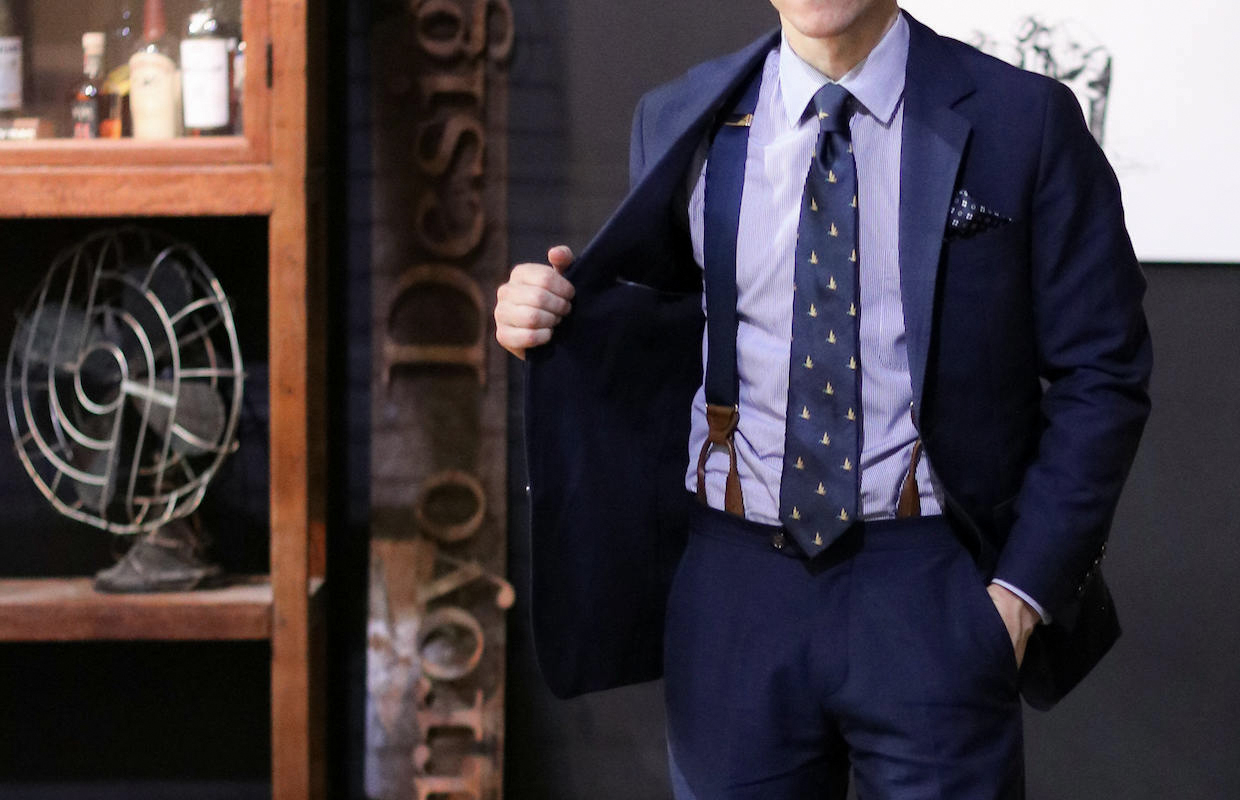 navy suspenders match perfectly with navy suit